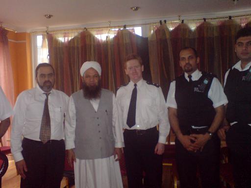 Dalawar Chaudhry, Imam Shahi Sahib and Inspector John Carroll at Chaudhry’s TKC in Southall